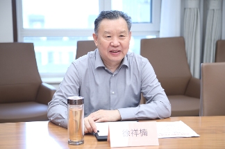 徐祥楠理事长会见南康区委副书记、区长李赣兴一行(图2)