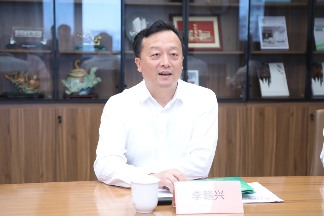 徐祥楠理事长会见南康区委副书记、区长李赣兴一行(图3)