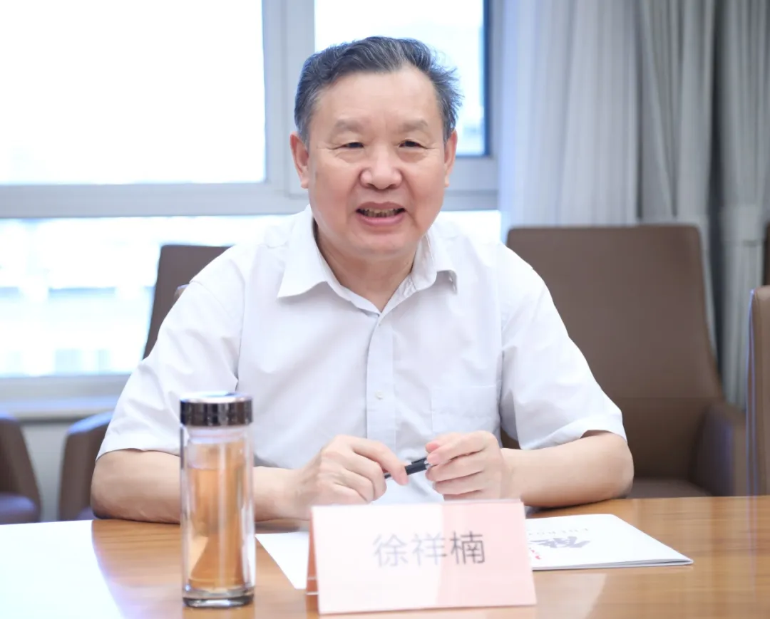 徐祥楠理事长会见九江镇党委书记罗淮东一行(图2)