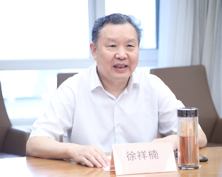 徐祥楠理事长会见沈阳市于洪区人民政府区长马明良一行(图1)