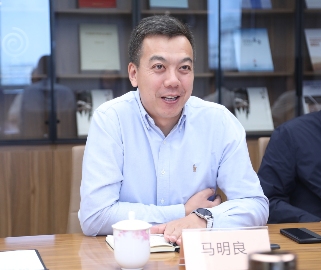 徐祥楠理事长会见沈阳市于洪区人民政府区长马明良一行(图2)